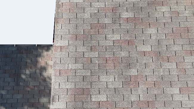 Closer aerial photograph of a visible roof surface